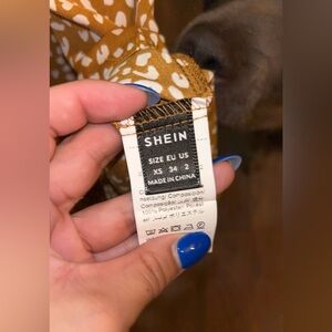 Never worn fits like a small